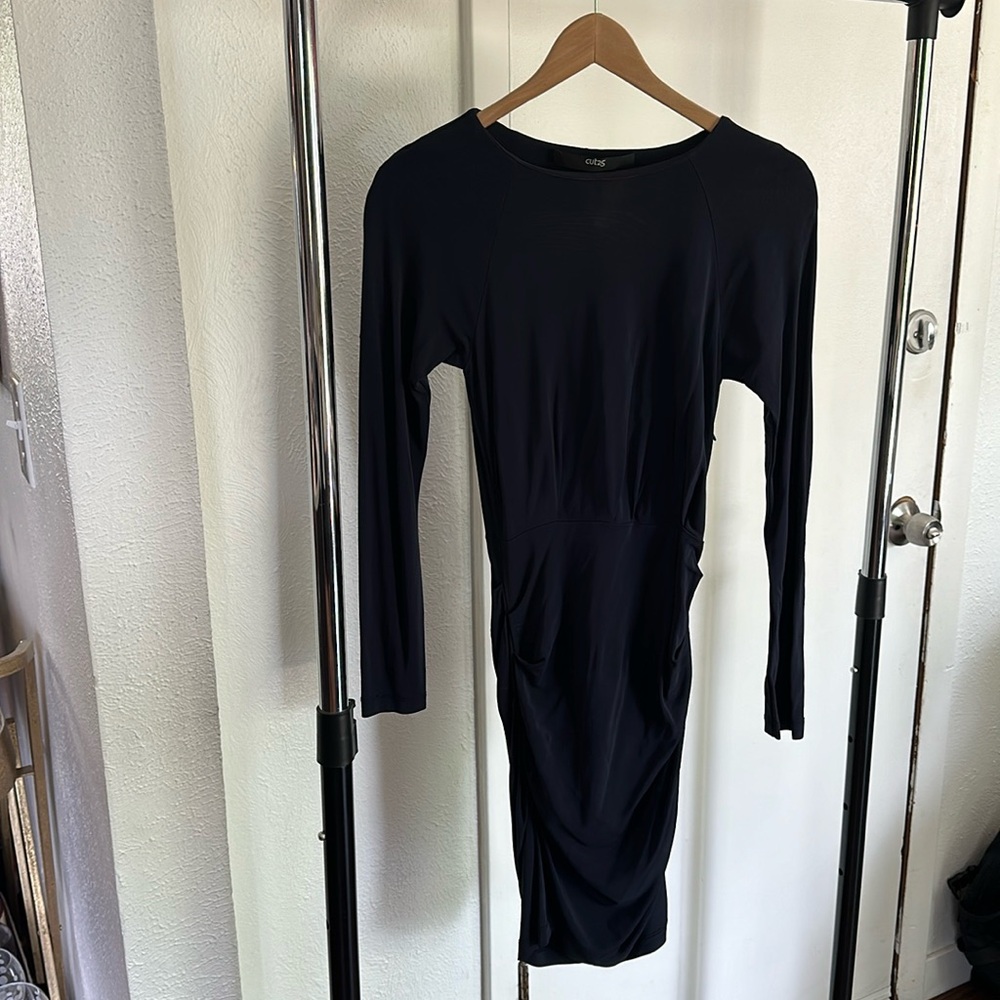 Dark navy tight mid dress with long sleeves.